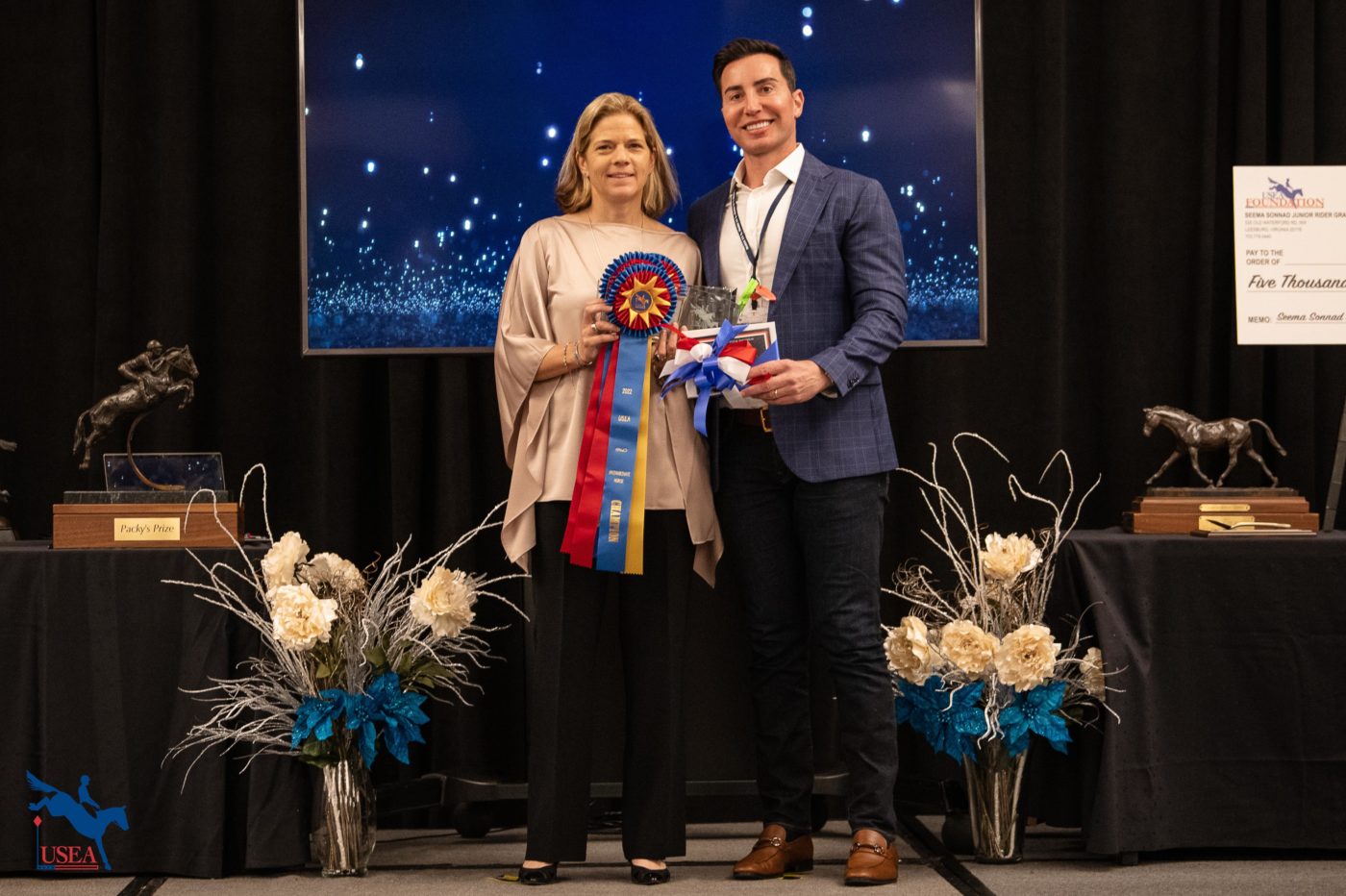 Connections of Shanroe Cooley accept both the Intermediate Horse and Intermediate 7-Year-Old Horse of the Year Awards