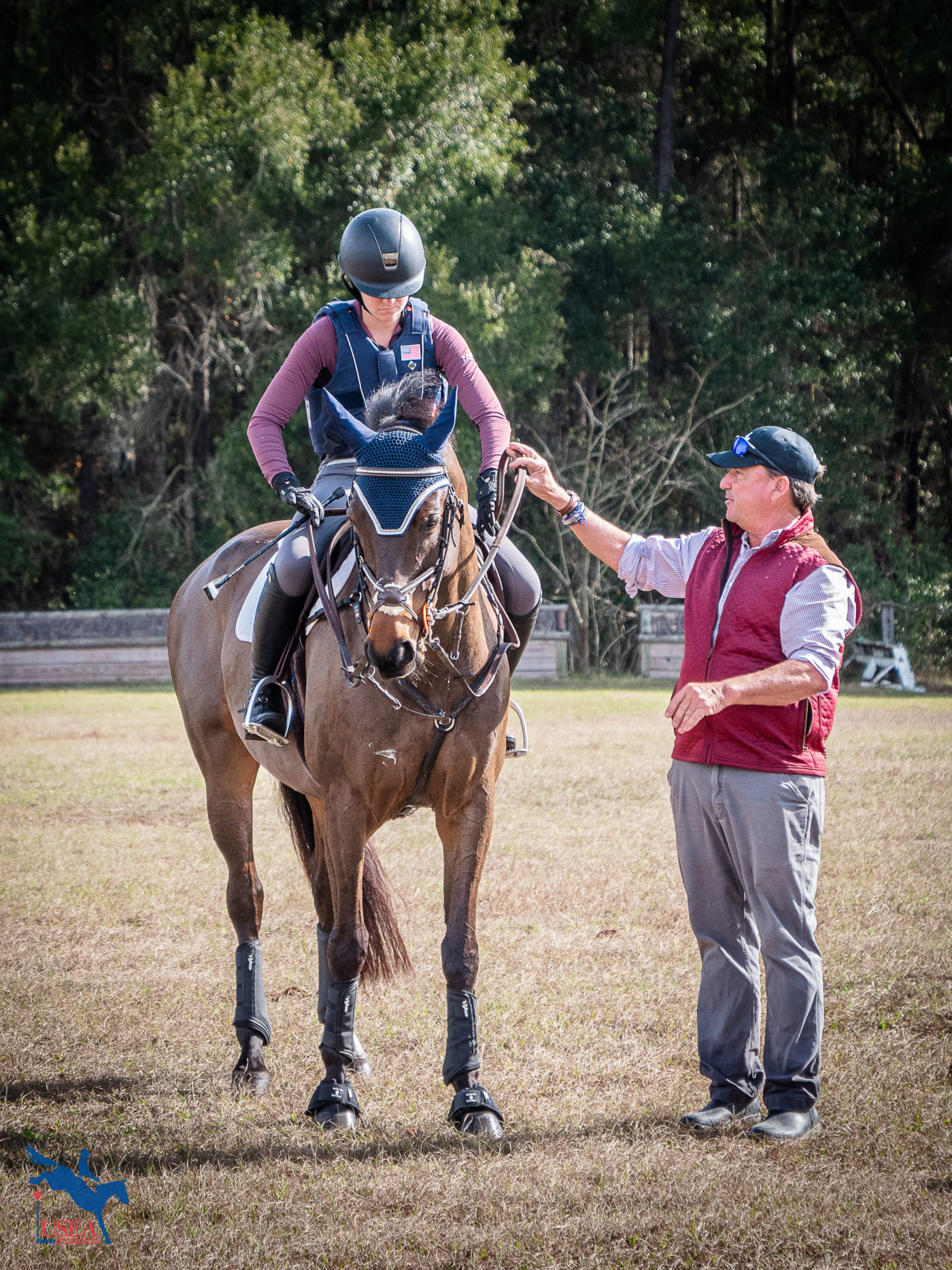 O'Connor instructs on cross-country day. USEA/Lily Stidham photo.