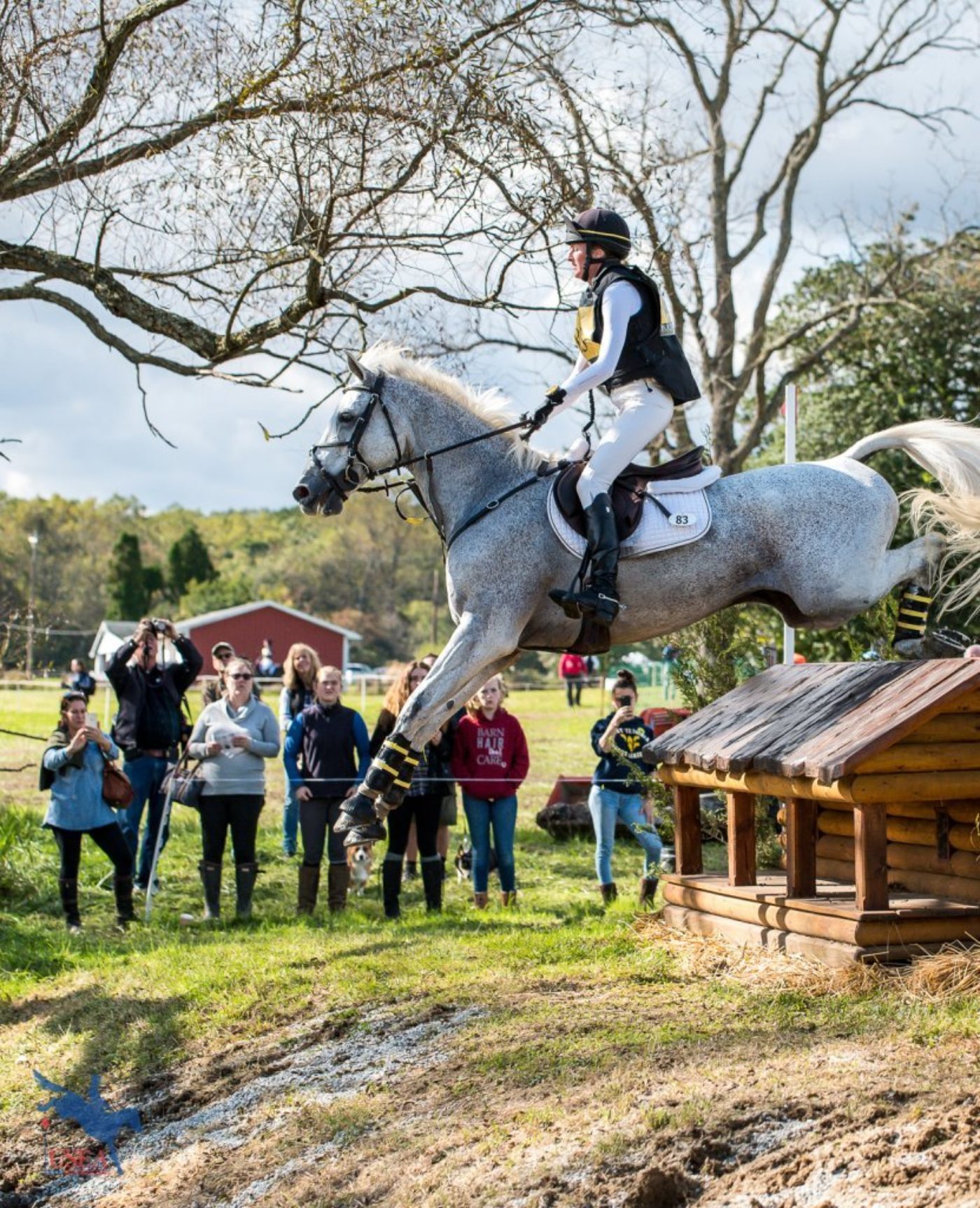 Bombs away! A spectacular leap into the Springhouse Water for Emily Hamel and Corvett. USEA/Jessica Duffy Photo.