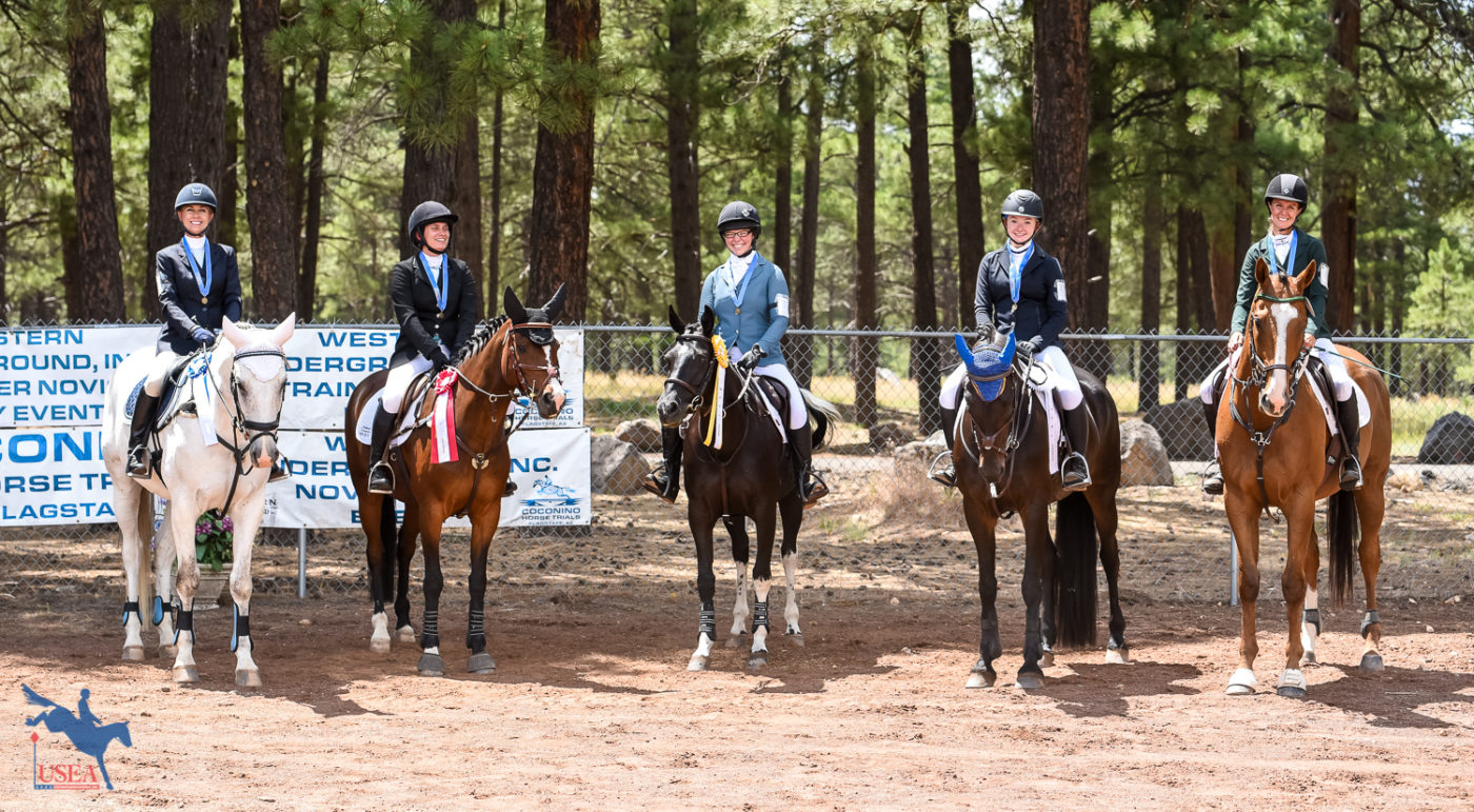 The competitors in the Beginner Novice Three-Day posing for a photo op. USEA/Jessica Duffy Photo.