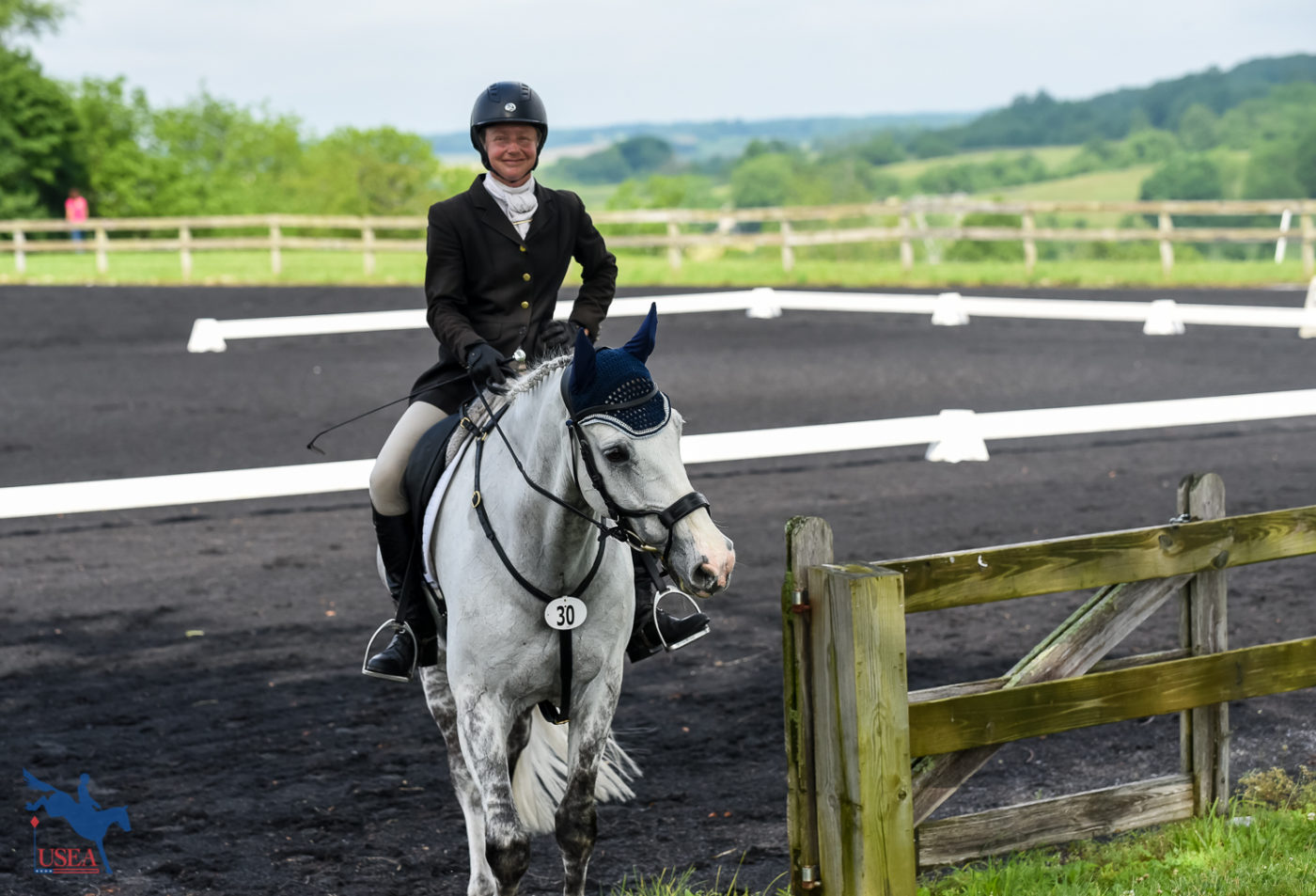 Plenty of smiling faces to be seen, even in the dressage arena! USEA/Jessica Duffy Photo.