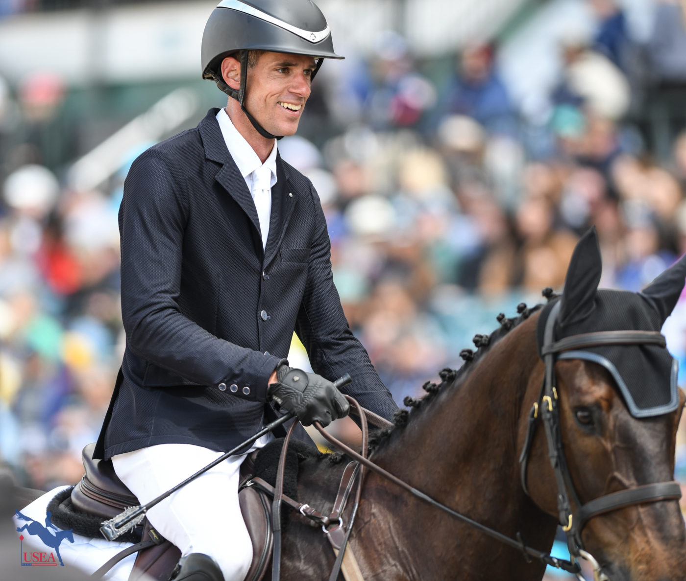 Dan Kreitl headed towards his supporters after a clear round on Carmango in the CCI4*-S. USEA/Lindsay Berreth photo