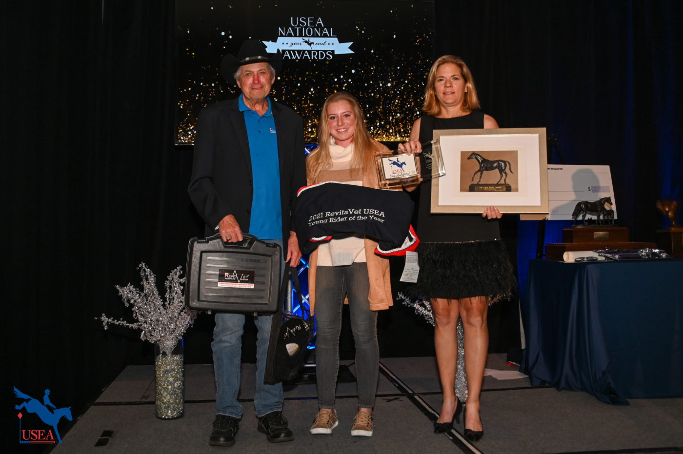 Tom Neuman of Revitavet presents the Revitavet USEA Young Rider of the Year to Alexandra Baugh