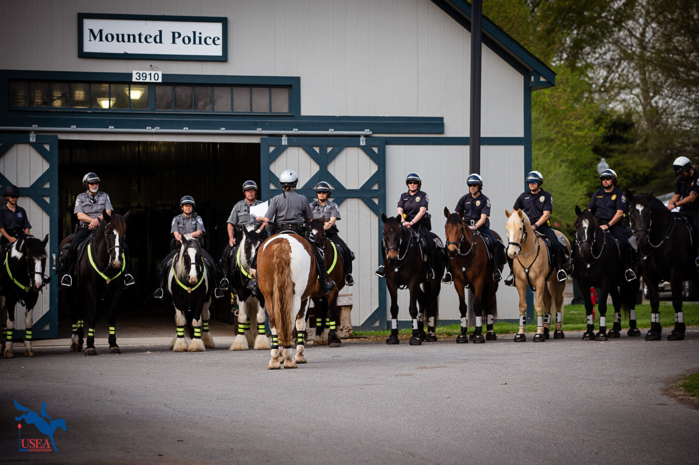 The Kentucky Horse Park Mounted Police Force have a quick meeting the morning of cross-country. USEA/Meagan DeLisle photo