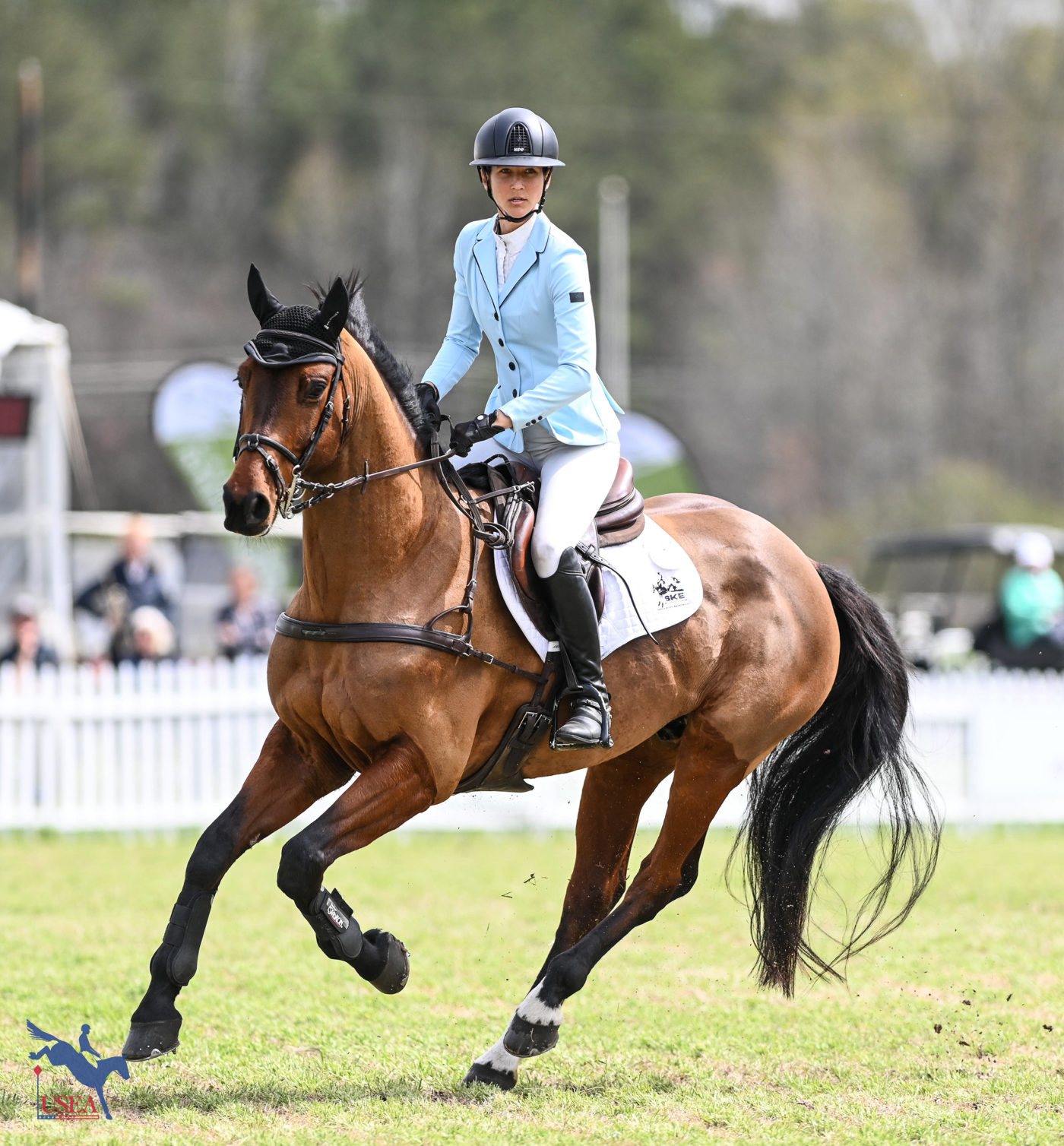 Sarah Kuhn sported a striking pale blue coat in the show jumping phase. USEA/Lindsay Berreth photo