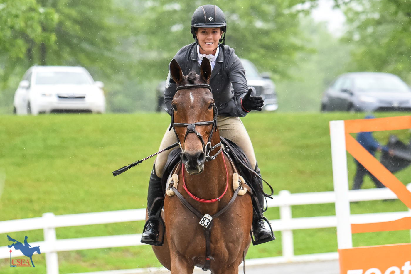 Despite the rain, Fylicia Barr and "Sunny" were all smiles after their winning show jumping round. USEA/Jessica Duffy Photo.